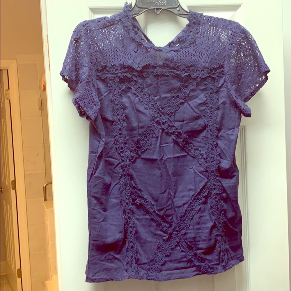New. Blue shirt